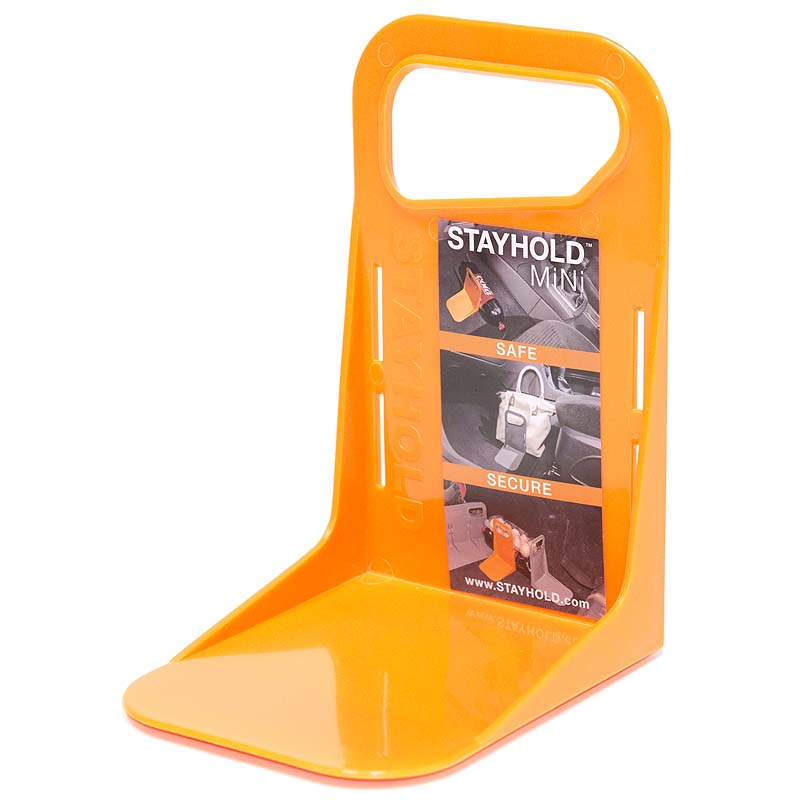 Le Stayhold™ Mini, accessoire compact de 11,5 cm, se fixe facilement à la moquette de votre véhicule grâce à son VELCRO®. Idéal pour maintenir et protéger vos objets en toute sécurité.